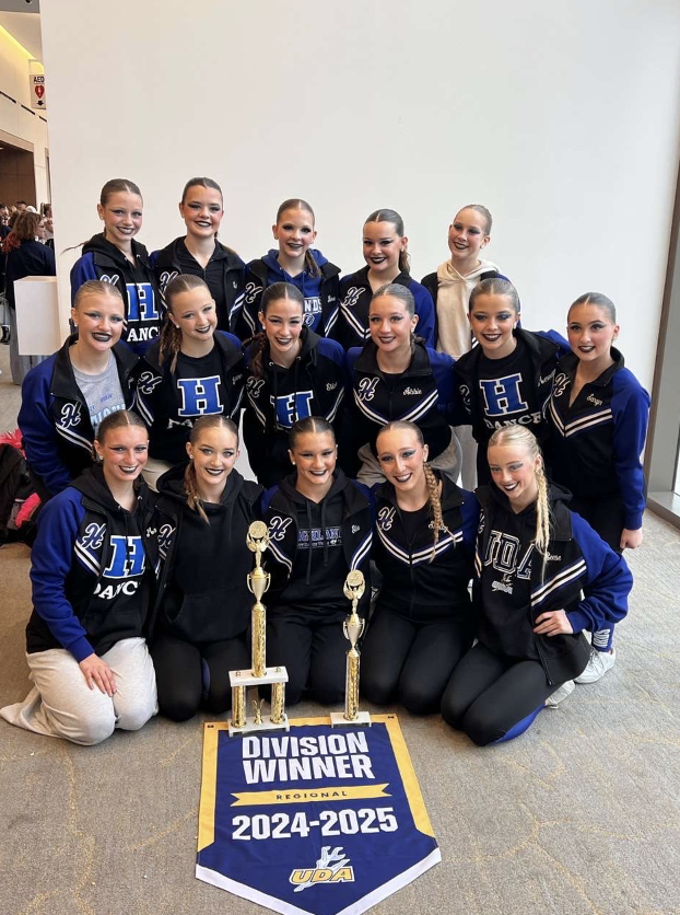 The Highlands varsity dance team posing with their trophies at the competition. (Photo taken by Adalynne Shaw)
